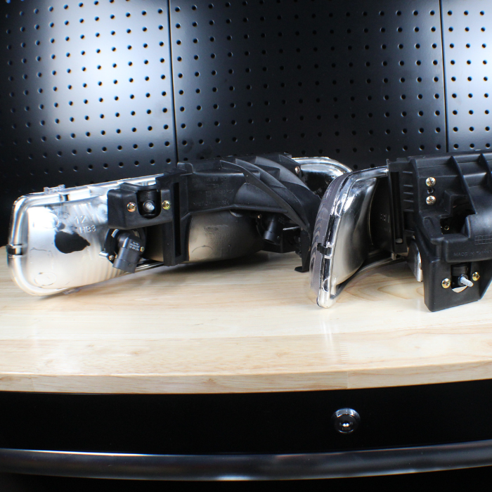 Pair Of Front Headlight Brackets Left+Right For 1999-2007 Chevy Silverado 1500 & GMC Sierra - 15798920